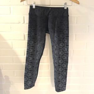 Black and gray patterned yoga/workout pants.